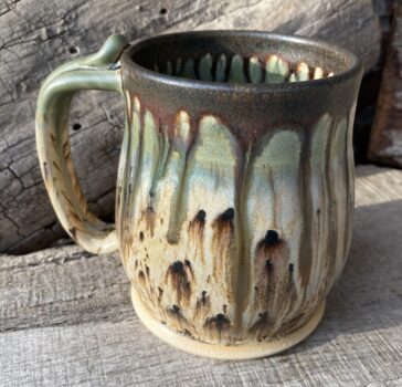 C shape handle with thumb rest round belly mug