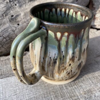 C shape handle with thumb rest round belly mug